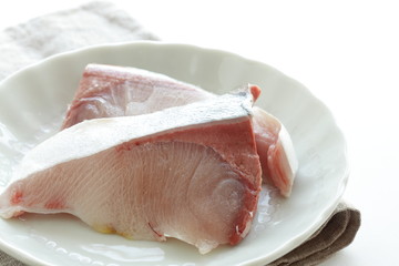 Freshness yellow tail fillet on dish for prepared food