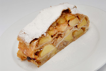 Tasty slice of apple pie isolated on white background