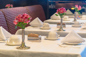 Fototapeta na wymiar Table in a restaurant with tea sets