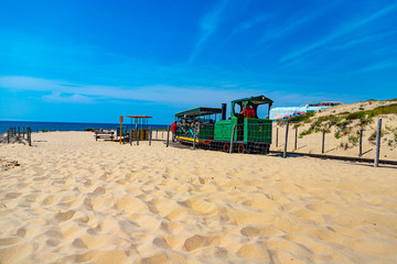 Train journey beside beach on sand dune - Cap ferret, France