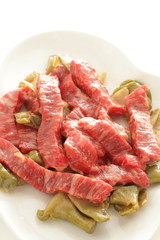 Chinese cooking, beef and szechuen pickles prepared on dish