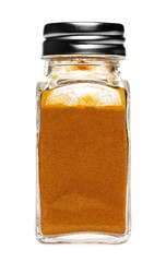 Turmeric powder in glass holder, bottle isolated on white background