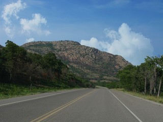 Wide view of Mt. Scott with gorgeous clouds in the skies, Oklahoma.