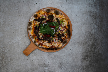 Fototapeta na wymiar Delicious Pizza on a background
