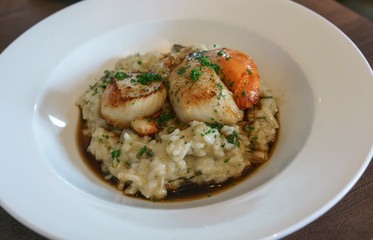 Delicious homemade grilled giant scallops with rice in Portree , Isle of Skye , Scotland