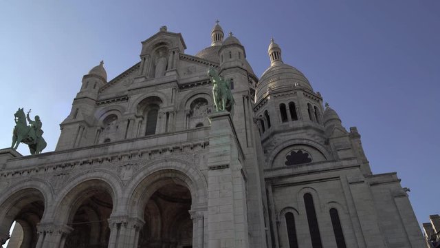 Left to right pan real time establishing shot of Sacre-Coeur Basilica. Temple in Paris