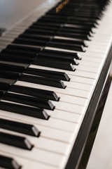 Naklejka premium piano keys photographed near