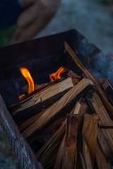 firewood is burning in a barbecue