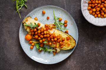Baked courgette with cheese and crispy spicy chickpeas