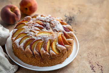peach cake  on wooden table