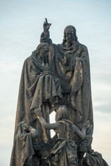 Saints Cyril statue on Charles Bridge in Prague, Czech Republic. Medieval Gothic bridge, finished in the 15th century, crossing the Vltava River