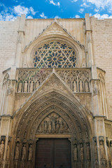 Valencia, Spain - 07/21/2019:Valencia Cathedral - La Seu de Valencia. The majestic cathedral located on La Plaza De La Virgen - architectural styles: Baroque, Romanesque and Gothic. 