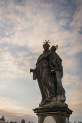 Anthony of Padua statue on Charles Bridge in Prague, Czech Republic. Medieval Gothic bridge, finished in the 15th century, crossing the Vltava River