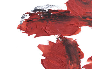 Red brush strokes with black traces