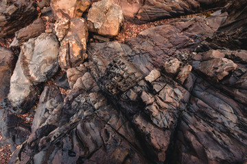 Stone background of the coast in India