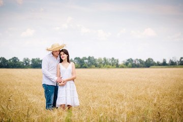 Portrait of a couple in a field