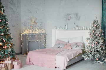 Christmas bedroom with pink and grey decoration