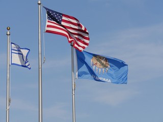Flags of the United States, Oklahoma State and Little Axe School in Oklahoma  flying from their...