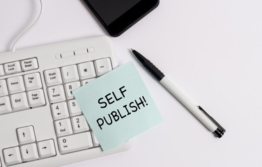 Handwriting text writing Self Publish. Conceptual photo writer publish piece of ones work independently at own expense White pc keyboard with empty note paper above white background