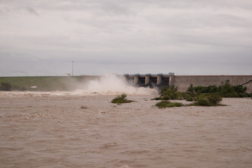 Water filled in Dam due to heavy rain and the gates of the reservior is opened to release the...