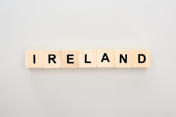 top view of wooden blocks with Ireland lettering on white background