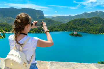 Tourist Enjoing View of Lake Bled