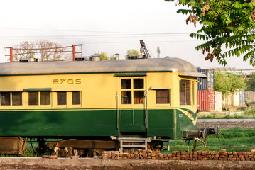 Green and yellow boggy of Pakistan railway trains.