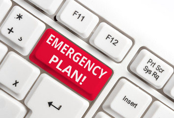 Word writing text Emergency Plan. Business photo showcasing actions developed to mitigate damage of potential events White pc keyboard with empty note paper above white background key copy space