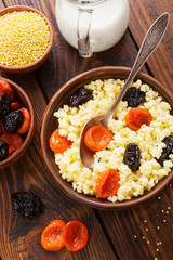 Millet porridge with dried fruits
