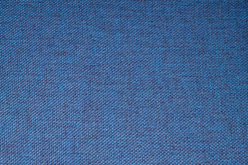 Dark blue background from a textile material linen natural canvas