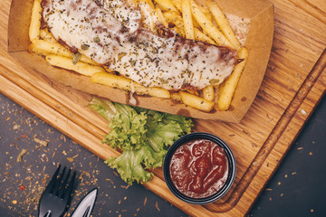  fast food and unhealthy eating concept - close up of fast food snacks and cola drink on wooden table. Fast food. Background. Hamburger. 