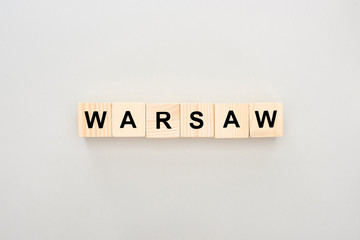 top view of wooden blocks with Warsaw lettering on white background