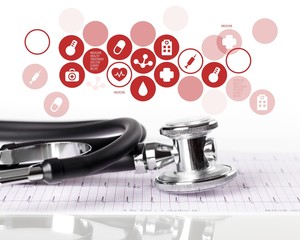 Stethoscope object and book  on backgrouund