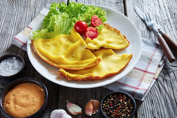 sliced omelet served on a white plate