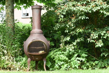garden fireplace in city garden © henkbouwers