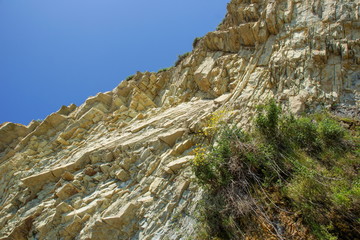 piece of rock and blue sky