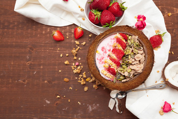 Healthy summer breakfast. Jar with granola, yoghurt and strawberry