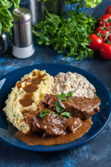 Stewed pork neck with potatoes and sauce