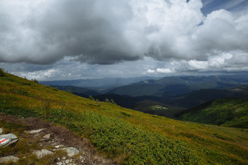 rain high in the mountains floods half the panorama of the mountains