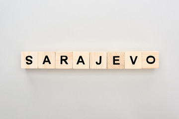 top view of wooden blocks with Sarajevo lettering on white background