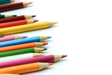 Fototapeta premium colored pencils on the white background. Place for text.