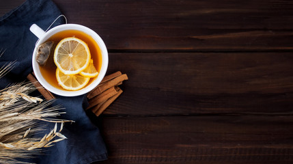 Flat lay view of herbal tea with lemon