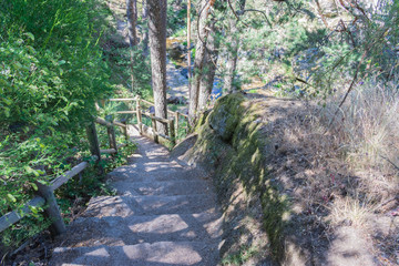 wooden bridge over mountain stream