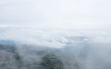High mountain range is covering with the mostly cloudy.