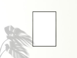 2x3 vertical Black frame for photo or picture mockup on white background with shadow of monstera leaves. 3D rendering.