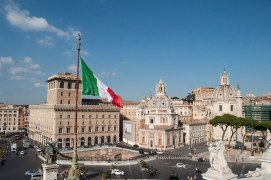 View of the city of Rome Italy with Italian flag