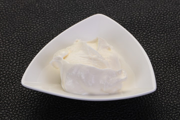 Sour cream in the bowl