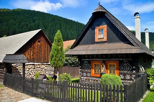 Slovak village Cicmany - famous distinctive village with decorated wooden houses with ornaments and inherent folklore and atmosphere.