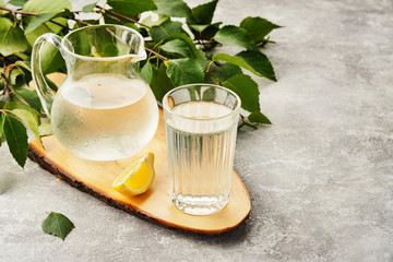 Birch juice. Traditional birch sap. A refreshing traditional Russian spring drink © FoodAndPhoto