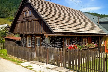 Slovak village Cicmany - famous distinctive village with decorated wooden houses with ornaments and inherent folklore and atmosphere.